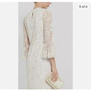 Beautiful ivory needle and thread dress